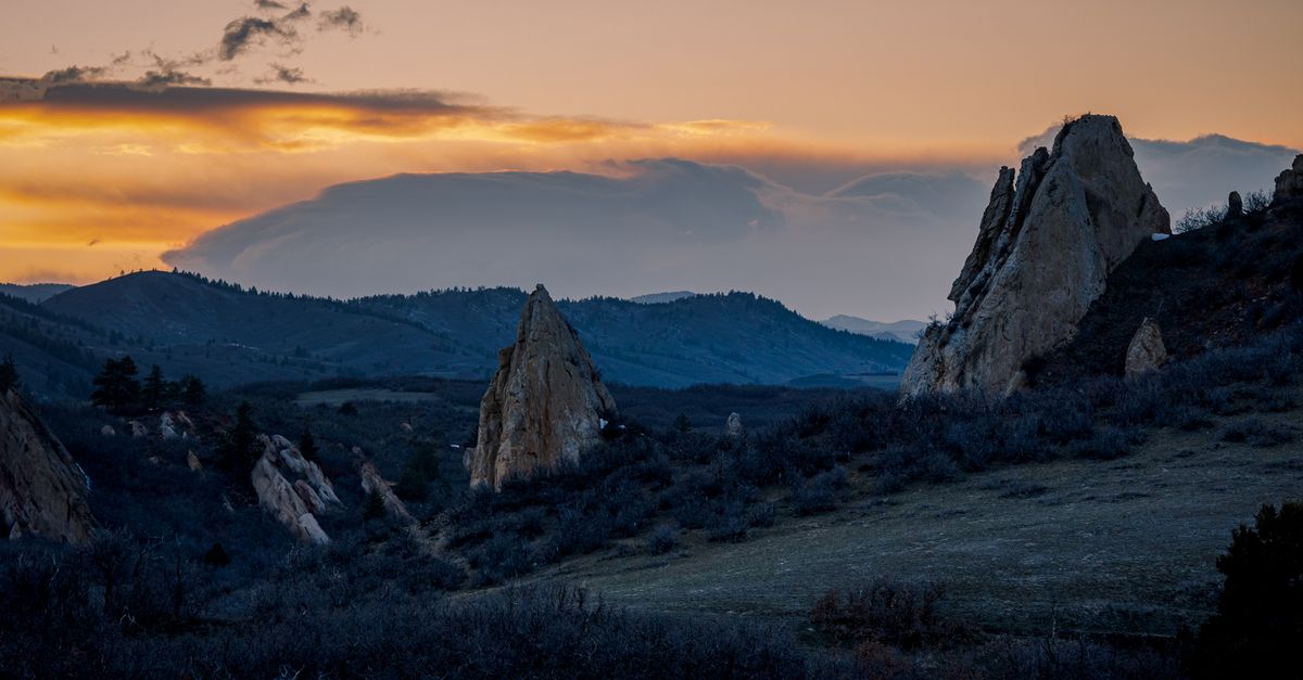 Scenic view of rocky pinnacles at sunset in Castle Rock, Colorado.