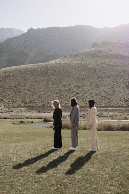 Portrait of Three Women with Hills in the Background