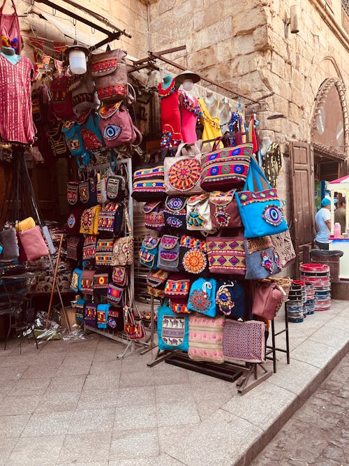 Bags and Souvenirs Displayed on a Stand