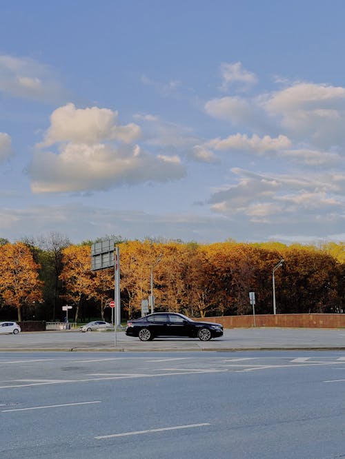 Black Car Parked in Empty Parking Lot