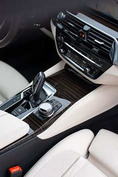 Detailed view of a luxury car interior showcasing modern design and features.