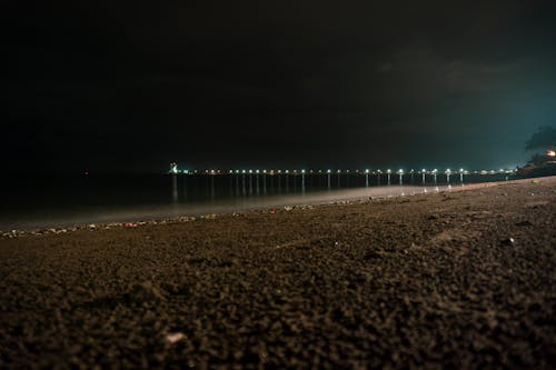Free Garbage at the seashore during night time Stock Photo