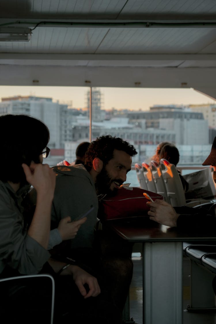 People Sitting On Public Transport