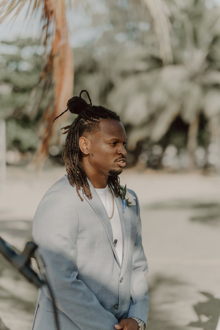 Man In Blue Blazer With Dreadlocks