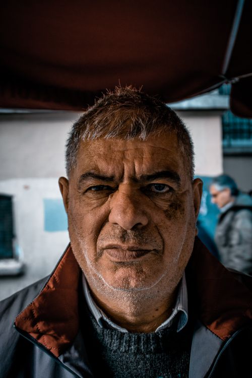 Free Close-up portrait of a senior man in Istanbul, showcasing character and depth. Stock Photo