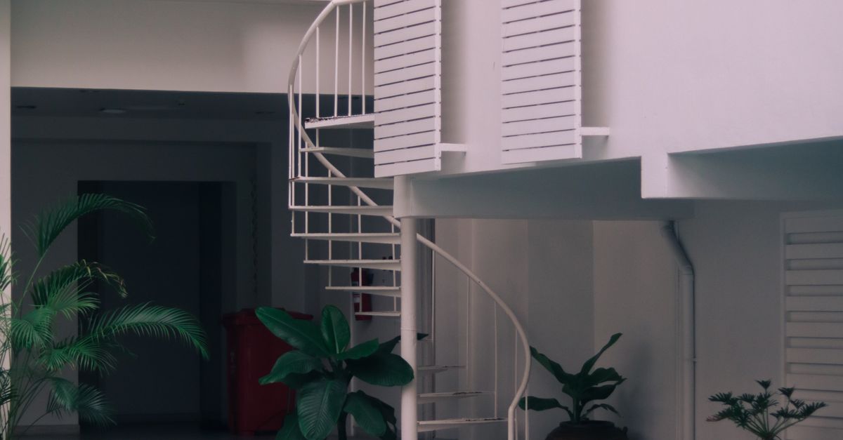 Spiral Staircase near the Swimming Pool · Free Stock Photo