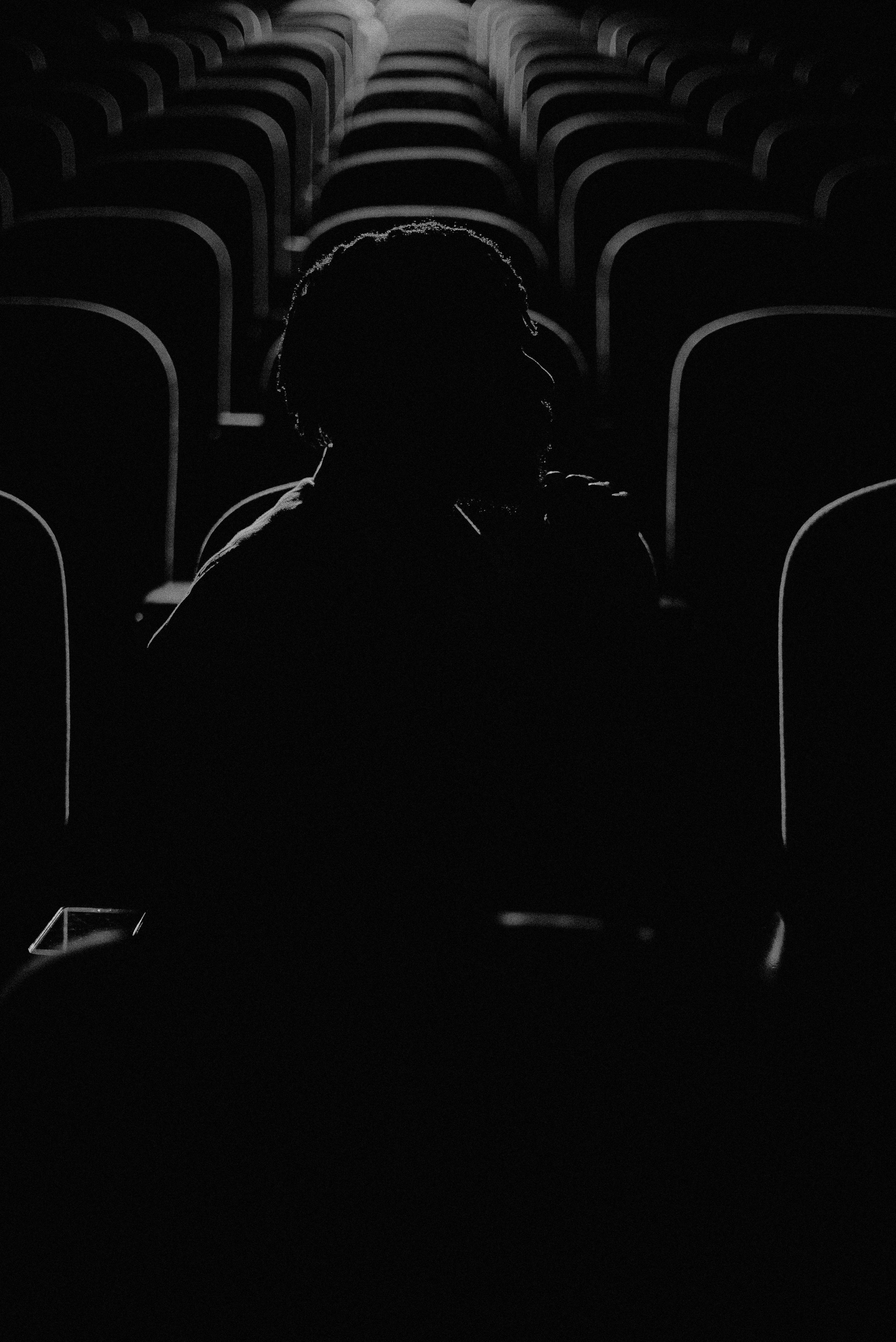 Free Silhouette of a person in a dark theater in Lekki, Nigeria. Stock Photo