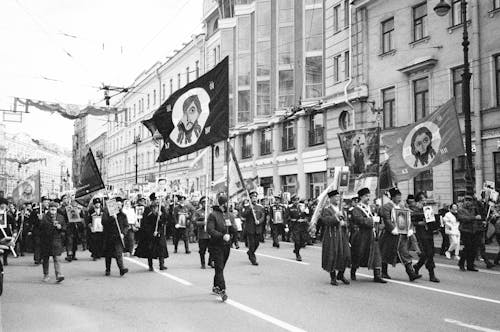 Grayscale Photo of People Protesting on Street