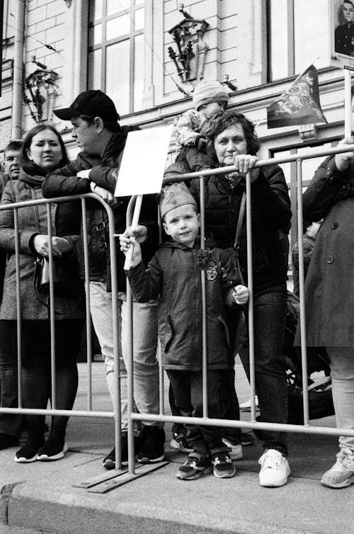 Black and White Photo of a Family Protesting