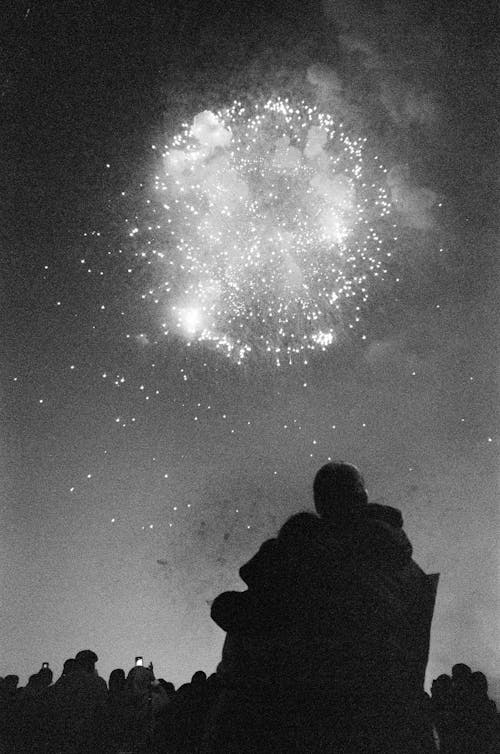 Silhouette of a Couple Watching Fireworks