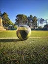 Close-Up Shot of a Soccer Ball on Football Field
