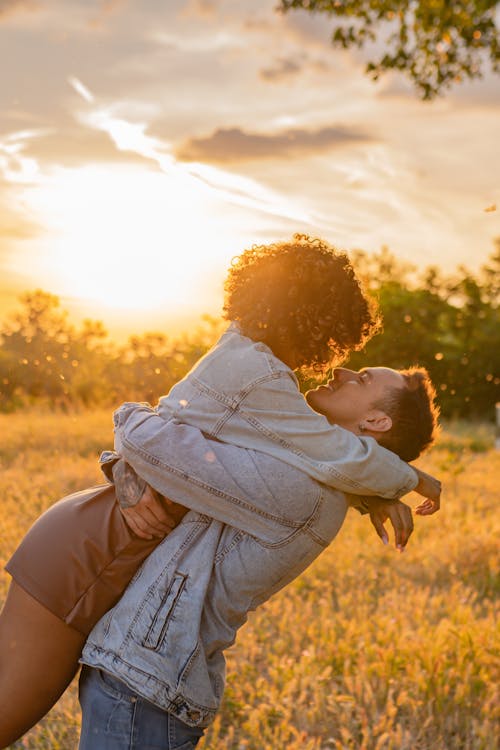 Couple Embracing on Meadow