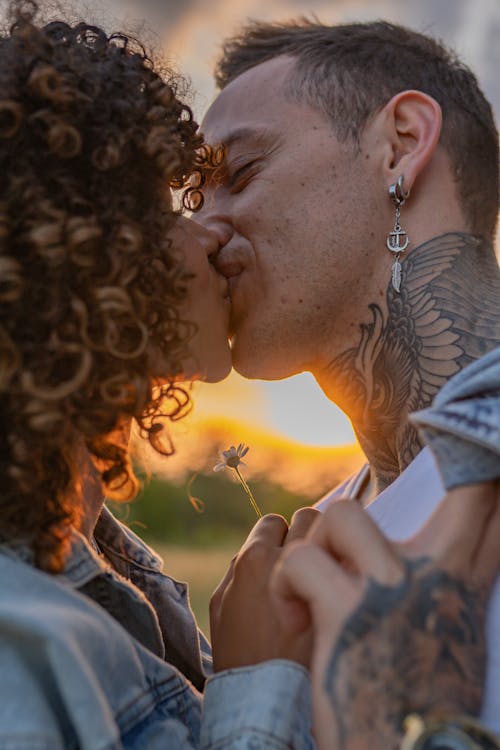 Free Man and Woman Kissing Stock Photo