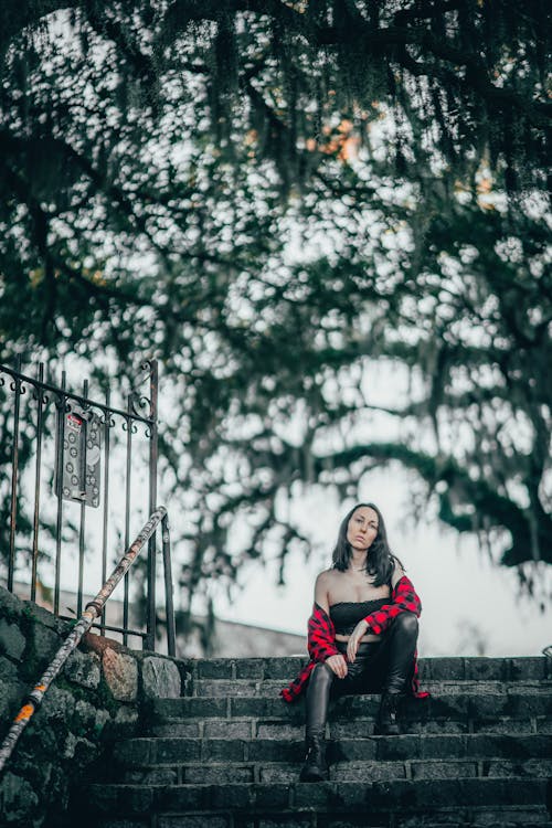 Portrait of a Woman Sitting on Steps