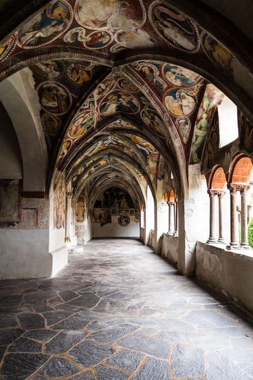 Free Intricate frescoed hallway in Brixen, showcasing medieval art and architecture. Stock Photo