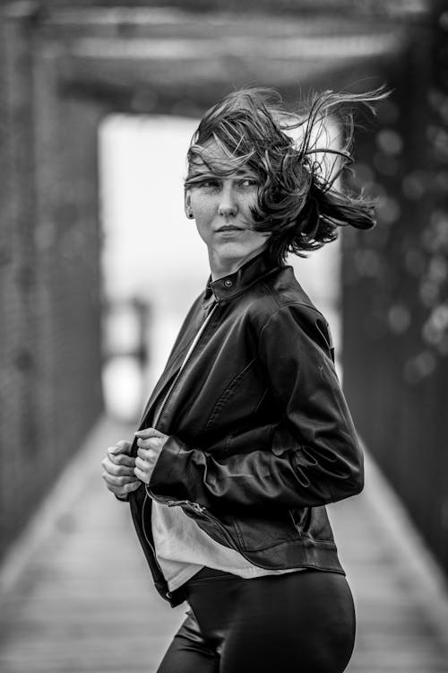 Woman in Leather Jacket with Hair Flying