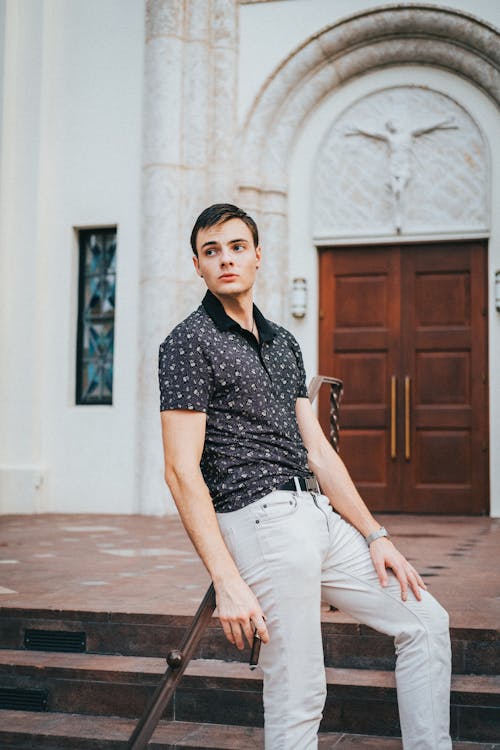 Portrait of a Man Standing in Front of a Church