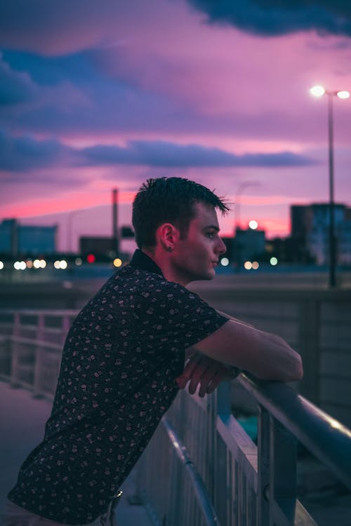 Portrait of a Man in a City at Dusk