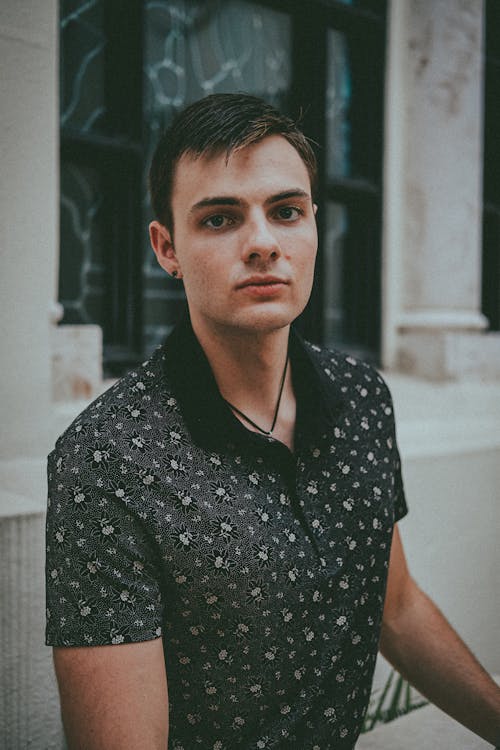 A Man in Black and White Button Up Shirt