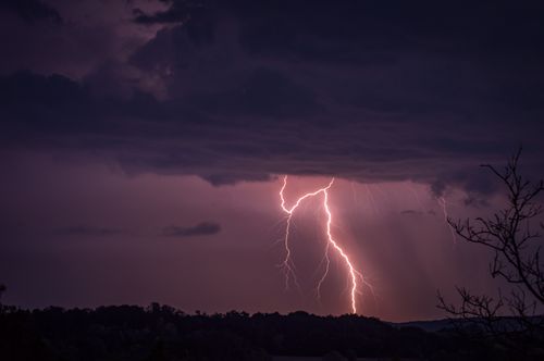 Free Captivating shot of a vivid lightning bolt in a stormy sky highlighting nature's power. Stock Photo