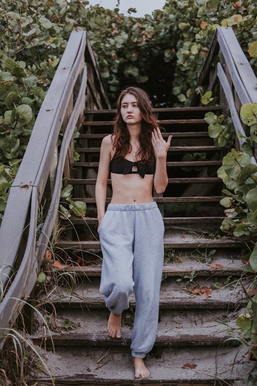 A Woman Walking Down the Stair