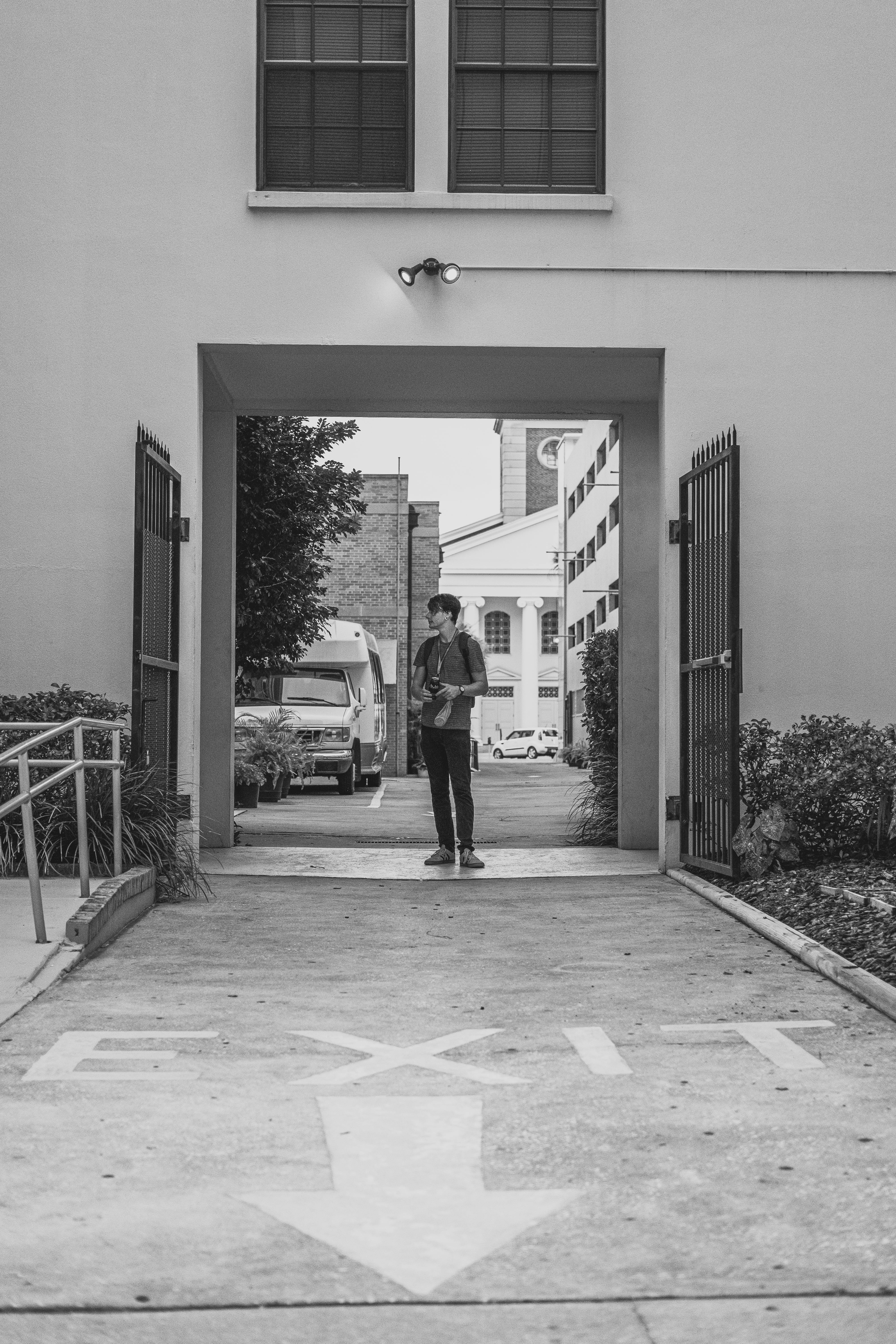 A Man Standing in a Gate · Free Stock Photo