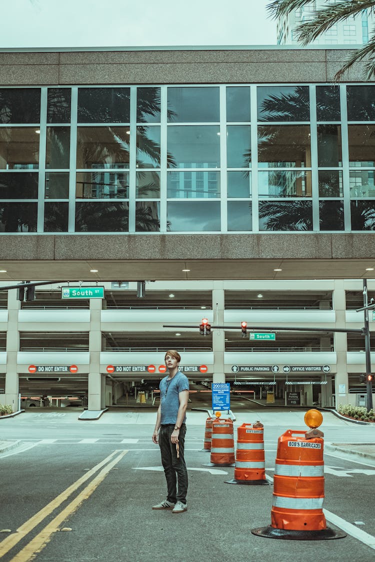 A Man Standing Near The Building