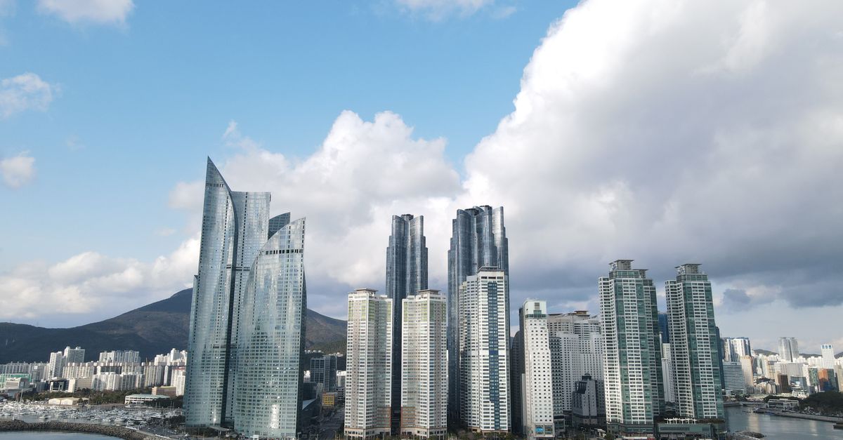 Dramatic skyline of Busan featuring modern skyscrapers in Haeundae District.