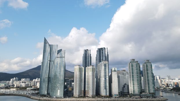 Dramatic skyline of Busan featuring modern skyscrapers in Haeundae District.
