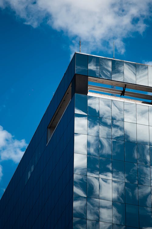 Free Black and White Concrete Building Under Blue Sky Stock Photo