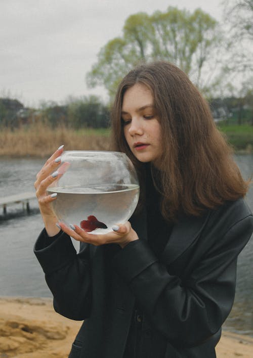 Free Girl Holding a Fishbowl  Stock Photo