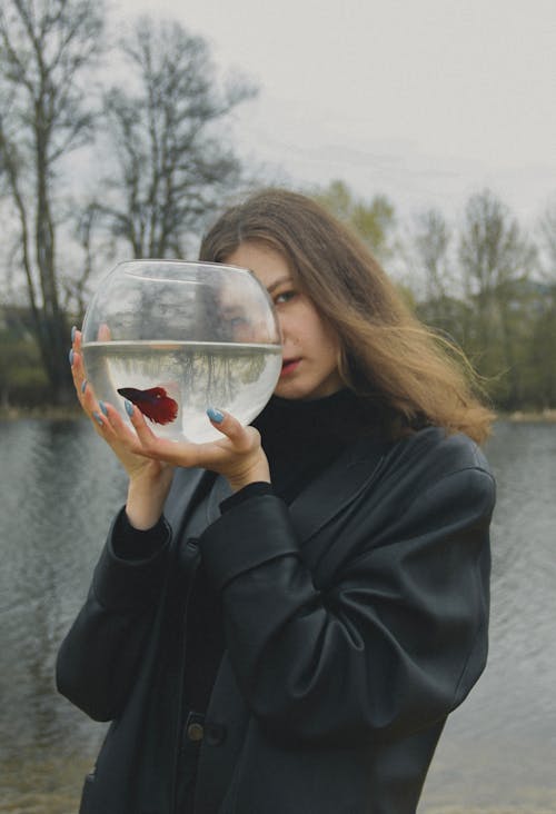Woman Posing with Aquarium