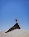 A Cross on the Roof Under Blue Sky