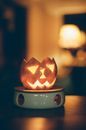 Jack O Lantern on Gray Ceramic Platform