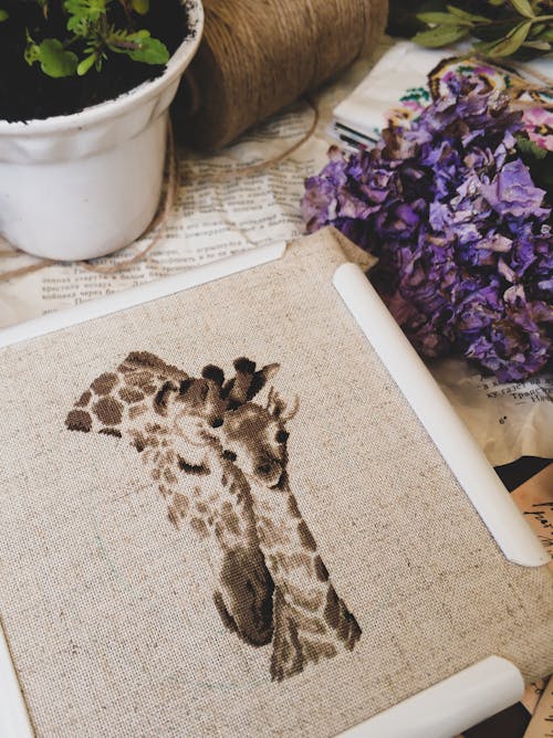 Free Handmade Embroidery with Giraffe Design Stock Photo