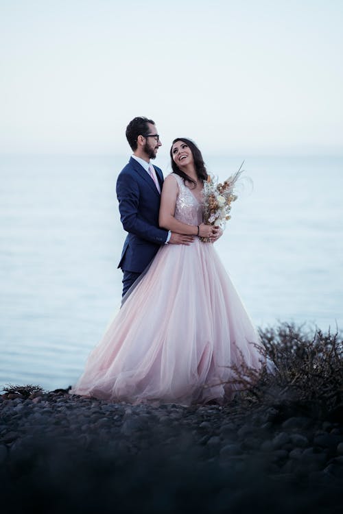 Portrait of Bride and Groom on Shore