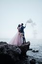 Portrait of Bride and Groom on Seashore
