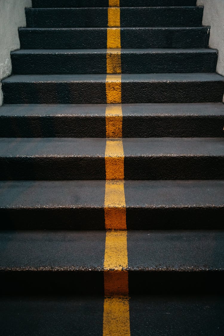 Black Concrete Stairs With Yellow Line