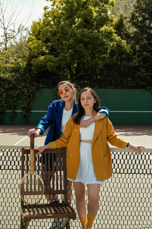 Free Portrait of Two Women on Tennis Court Stock Photo
