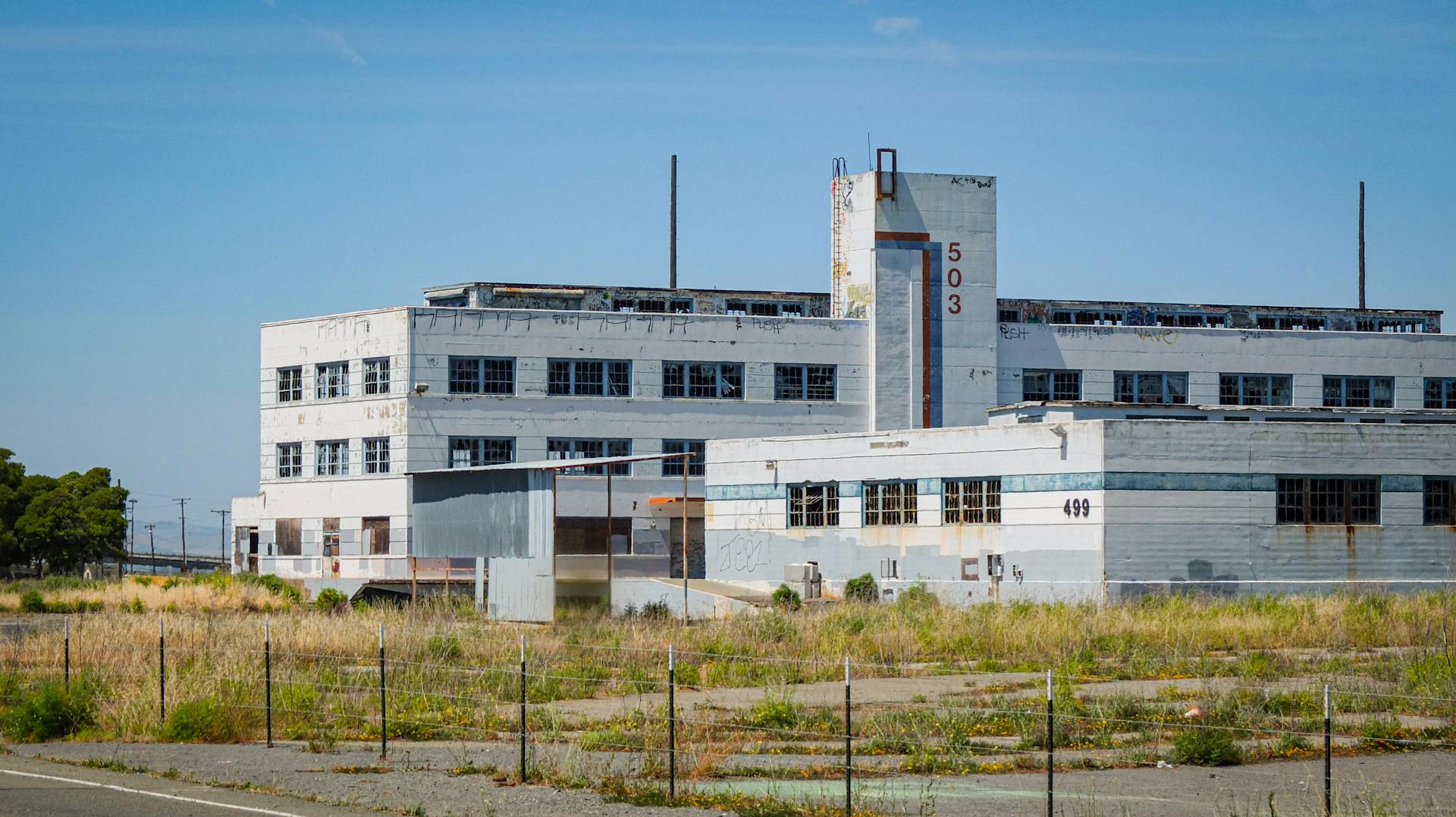 Fence near Factory Building
