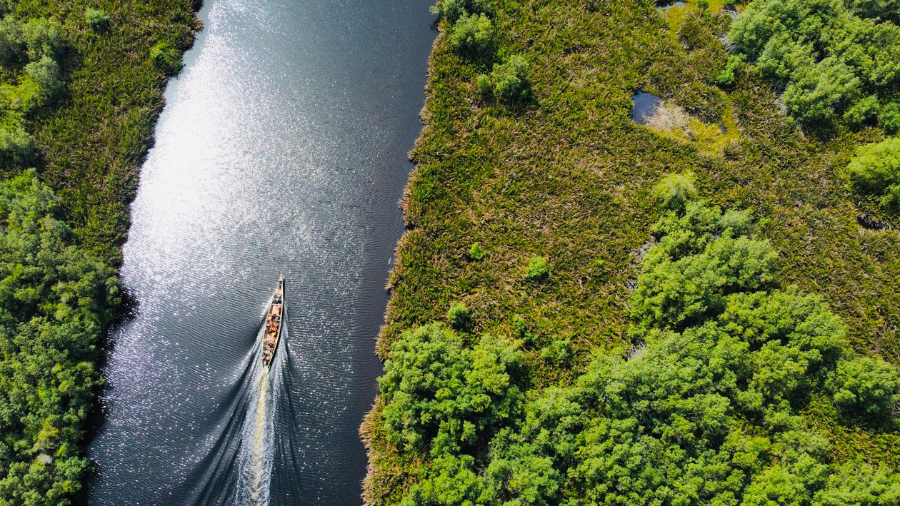 Aerial Photography of a Boat on the River · Free Stock Photo
