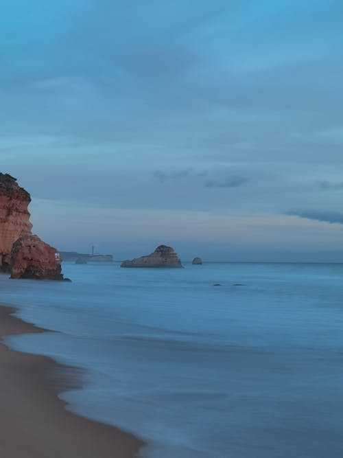 Foto d'estoc gratuïta de aigua, cel, formació de roques