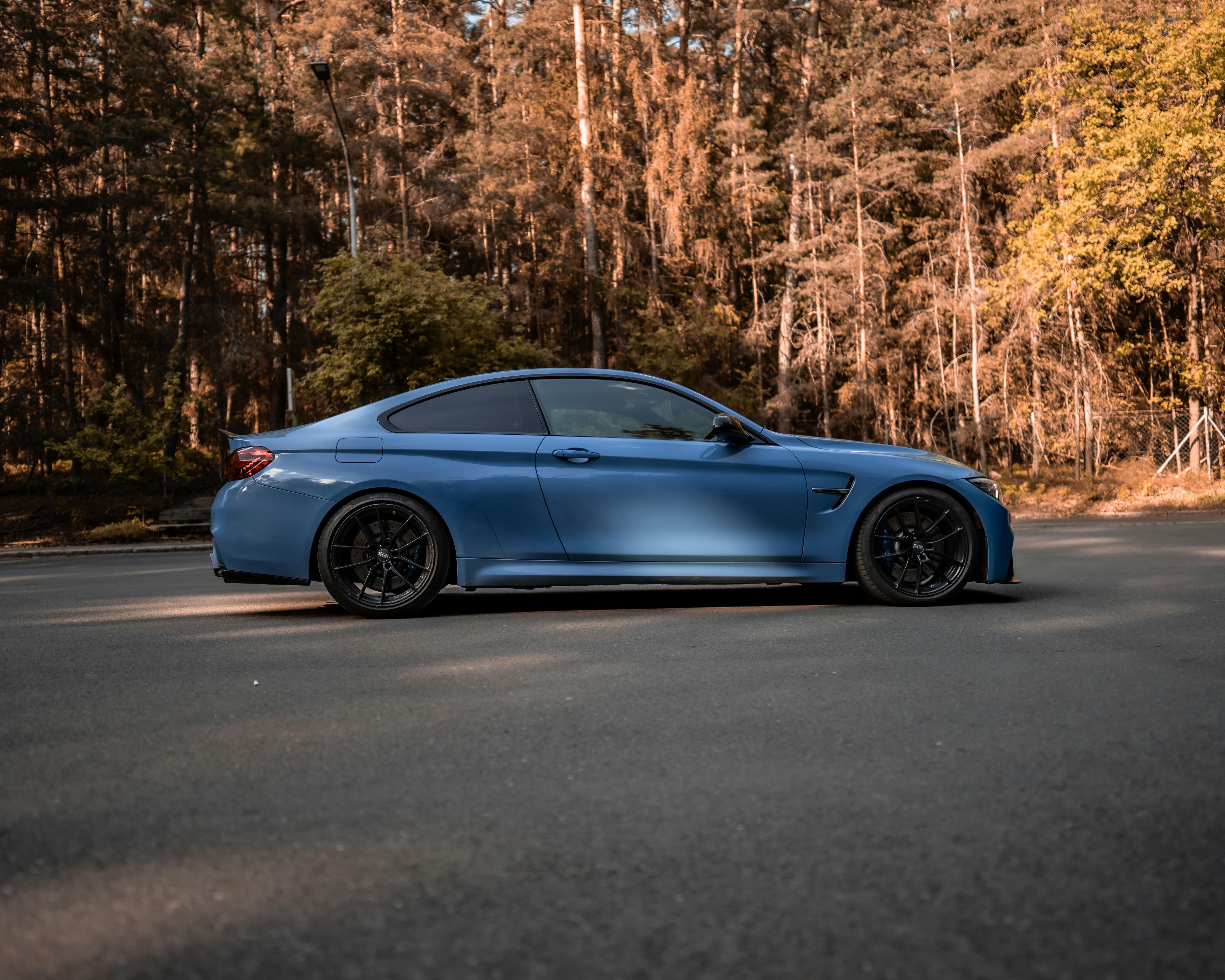 Photo of Blue Car with Black Wheels · Free Stock Photo