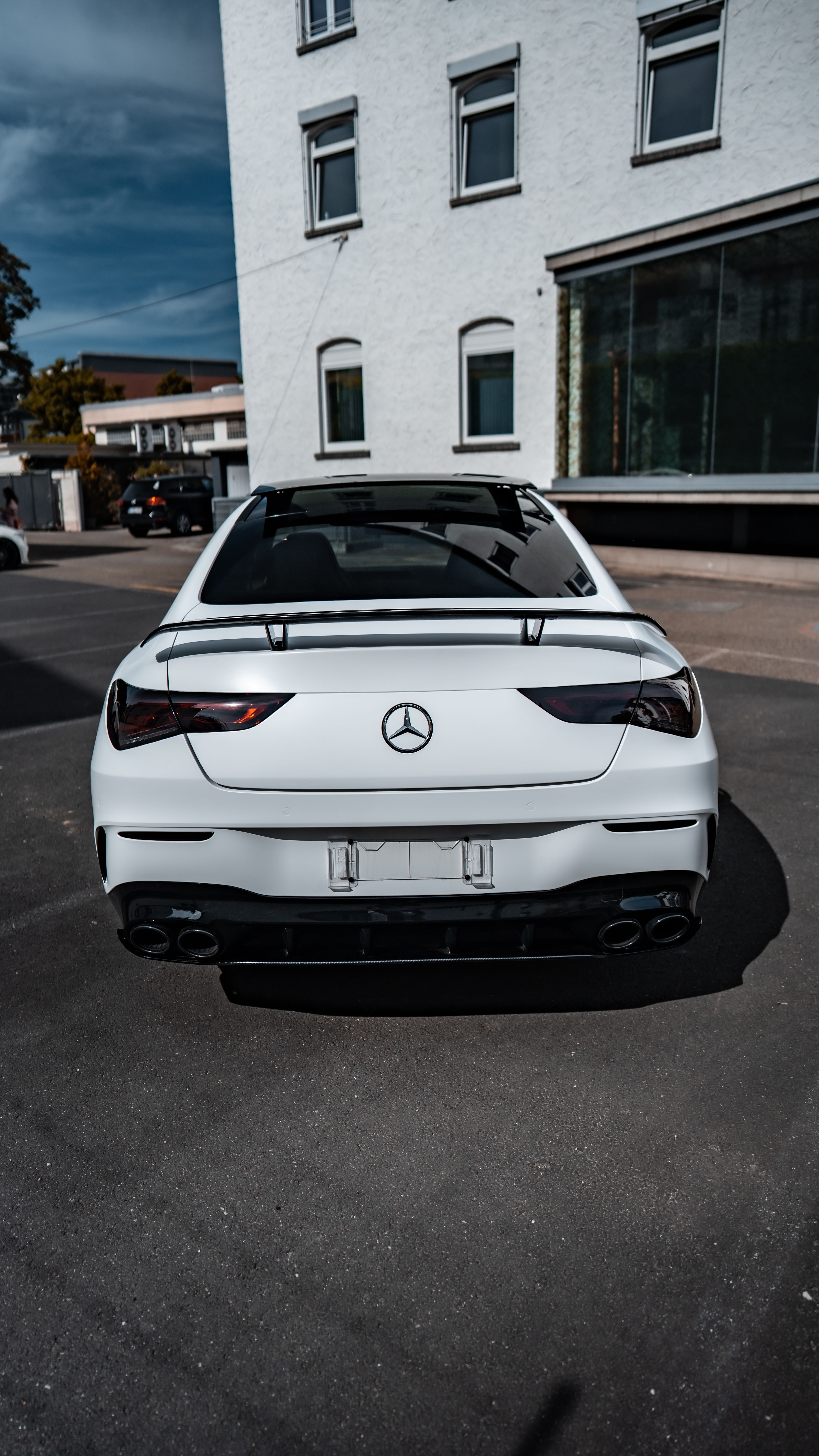 Photo of a White Sedan Car · Free Stock Photo
