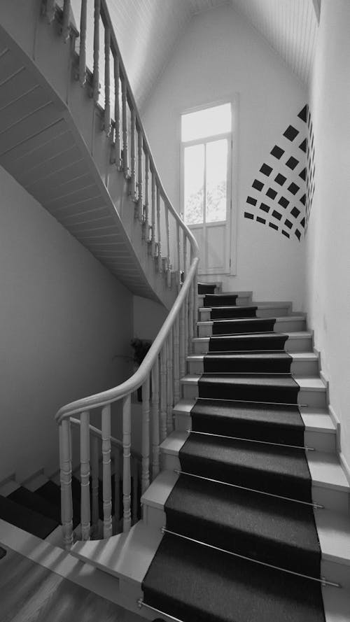 Grayscale Photo of a Stairwell