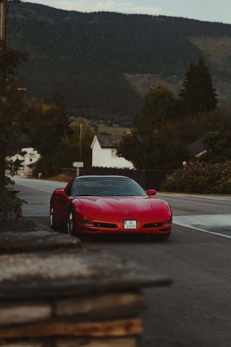 Red Sportscar On The Road