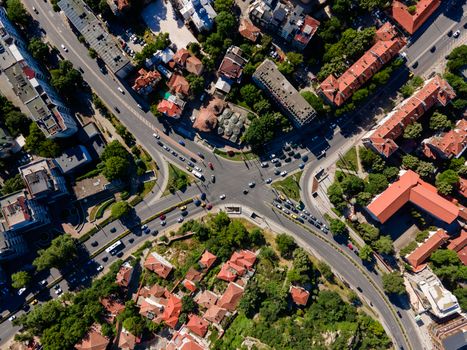 Aerial view of a bustling intersection in Plovdiv, Bulgaria, showcasing urban architecture.