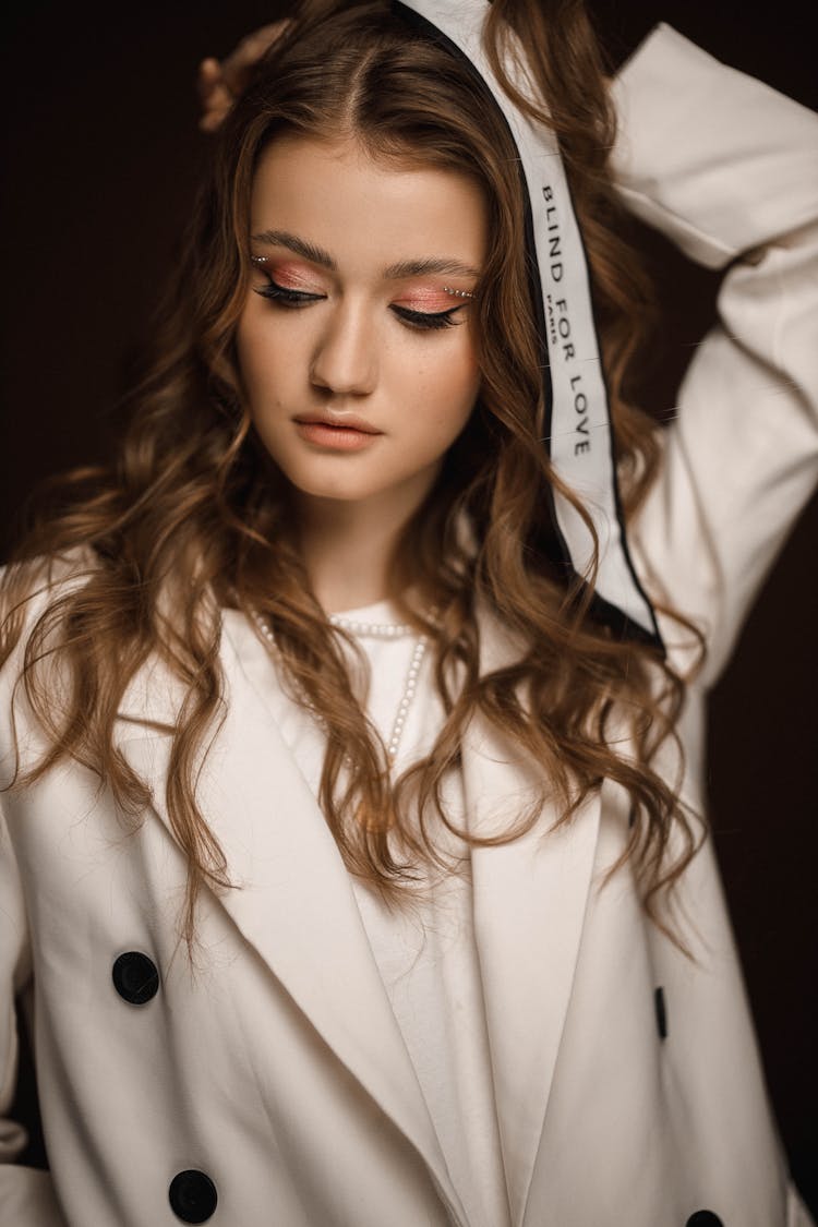 Girl With White Ribbon With Inscription In Long Brown Hair