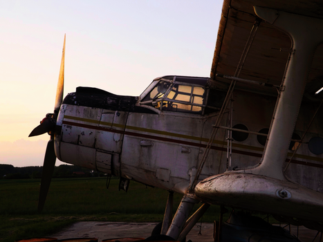 Close-up of an abandoned old airplane at sunset in Smederevo, Serbia.