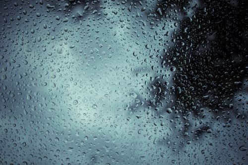 Free Raindrops on a window with a moody sky in Toluca de Lerdo, capturing nature's delicate balance. Stock Photo